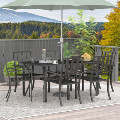 Patio with store umbrella set