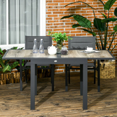 Plastic outdoor dining table best sale and chairs