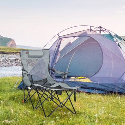 Folding chair with canopy and clearance footrest