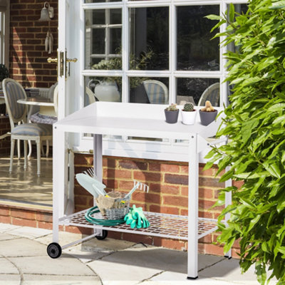 Outdoor potting bench store with wheels