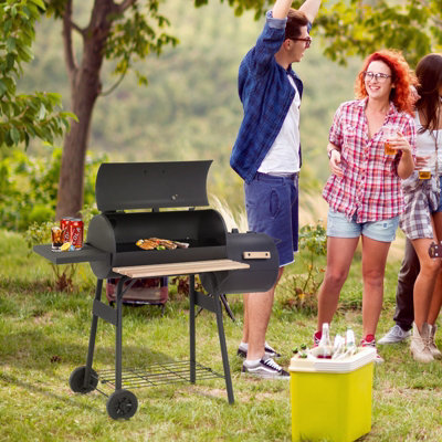 Charcoal grill and outlet smoker combo