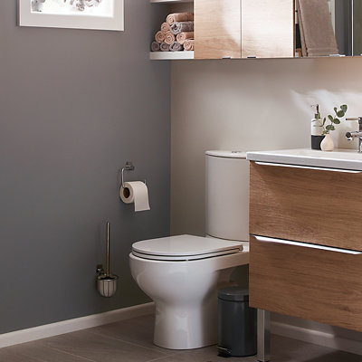 A small bathroom painted a stylish dark grey and white. Shop GoodHome bathroom and kitchen paint.