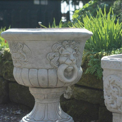 Pair of Lion Head design Stone Vases and Planter Troughs