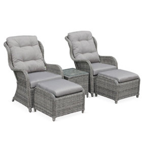 Pair of rounded polyrattan garden armchairs with footstools and side table - Barletta - Grey rattan Beige cushions