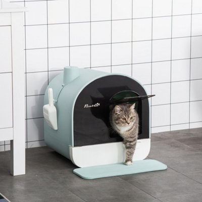 How to get cat to use litter box with door outlet