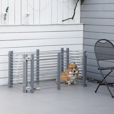 Dog pen with outlet gate