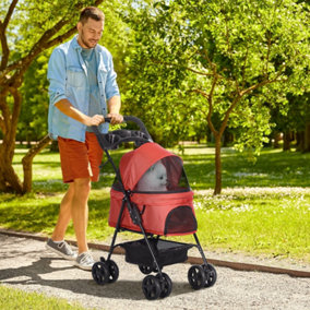 PawHut Pet Stroller Foldable Carriage with Brake Basket Canopy- Red
