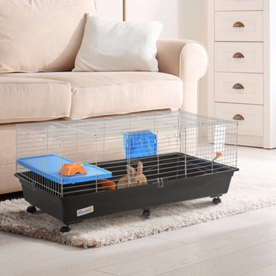 Guinea pig cage shelf and outlet ramp