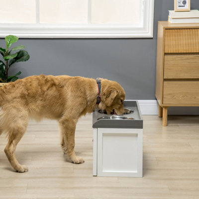 Elevated dog bowls with storage clearance drawer