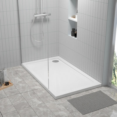 https://media.diy.com/is/image/KingfisherDigital/pearlstone-rectangular-shower-tray-waste-not-included-1200mm-x-700mm-white-balterley~5056211826798_02c_MP?$MOB_PREV$&$width=618&$height=618