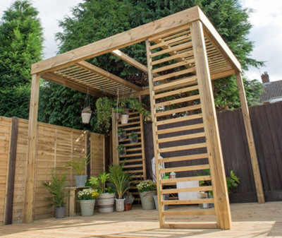A pergola with horizontal slats supporting a vertical garden filled with trailing foliage and hanging plants, adding lush greenery to a small outdoor space.