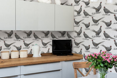 White and grey Pheasant print wallpaper in a kitchen.