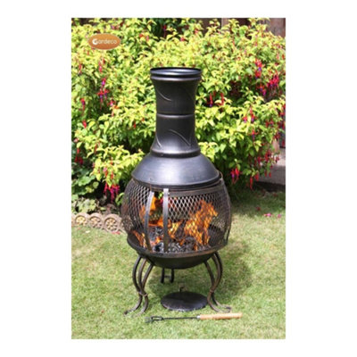 Pot belly steel chimenea with central mesh screen.