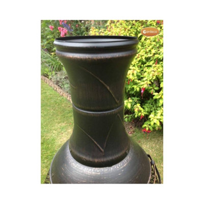 Pot belly steel chimenea with central mesh screen.