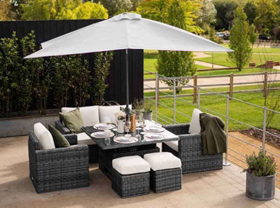 Primrose Living Luxury Rattan 6 Seater Garden Sofa Set with Square Rising Table and Parasol in Stone