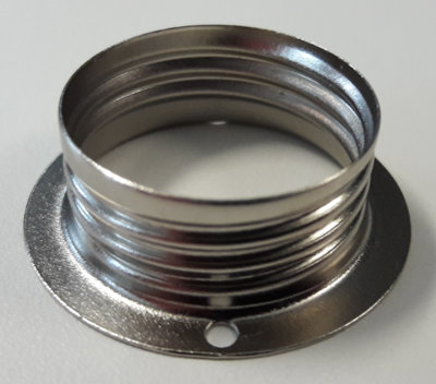The replacement light securing ring, which is made from pressed steel and has a thread on the outside of the ring to distinguish it from the item in the safety notice.