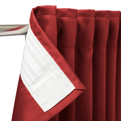 Red pencil pleat curtains.