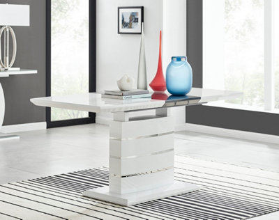 Renato 120 - 160cm 4 6 Seater White High Gloss Extending Dining Table with Chrome Accents and Statement Structural Plinth Leg