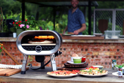 https://media.diy.com/is/image/KingfisherDigital/revolve-gas-pizza-oven-revolving-plate-pizza-oven~9501223378859_04c_MP?$MOB_PREV$&$width=618&$height=618