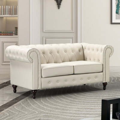 Cream leather store chesterfield sofa