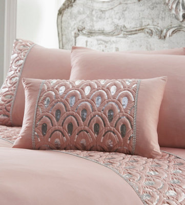 https://media.diy.com/is/image/KingfisherDigital/ritz-pink-boudoir-cushion-32-x-50cm~5027392424912_01c_MP?$MOB_PREV$&$width=768&$height=768