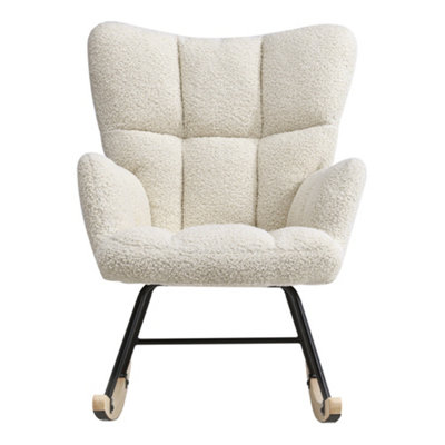 Tufted store rocker recliner