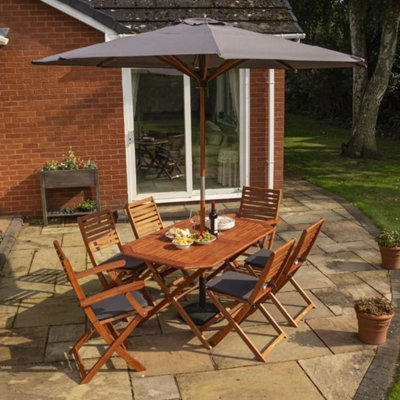 Wooden garden table online with parasol