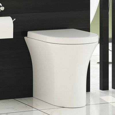 Royal Bathrooms Breeze Back To Wall Rimless Toilet Gloss White Round Pan with Soft Close Seat