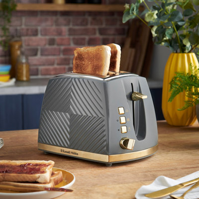 https://media.diy.com/is/image/KingfisherDigital/russell-hobbs-26392-groove-2-slice-toaster-grey~5038061143379_02c_MP?$MOB_PREV$&$width=618&$height=618