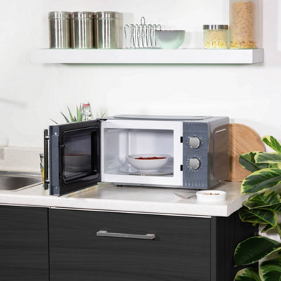 https://media.diy.com/is/image/KingfisherDigital/russell-hobbs-honeycomb-microwave-17-litre-700w-grey-manual-rhmm715g~5056233829500_04c_MP?$MOB_PREV$&$width=618&$height=618