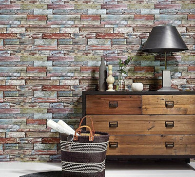 Rustic worn wood effect wallpaper in a room with a rustic wooden sideboard.
