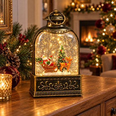 Santa Sleigh & Reindeer Water Light Up Lantern Christmas Scene Glitter 23cm