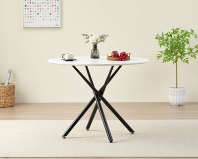 Seattle Circle Stone White Concrete Dining Table with starburst black legs