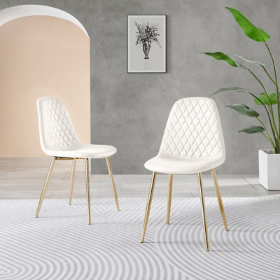 White leather dining chairs with gold legs online