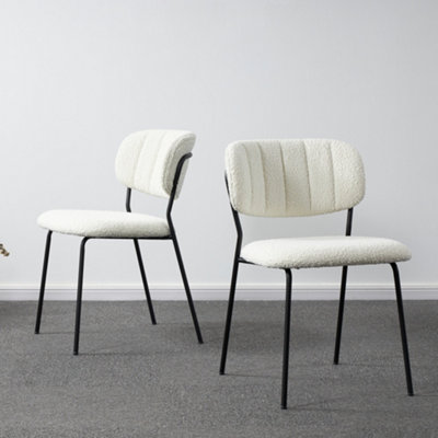 White stackable shop dining chairs