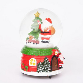 Shatchi Musical Christmas Snowglobe Large Water Ball Features Christmas Santa Snowman Scene House Resin Base- 10x15cm