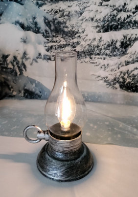 White deals oil lamp