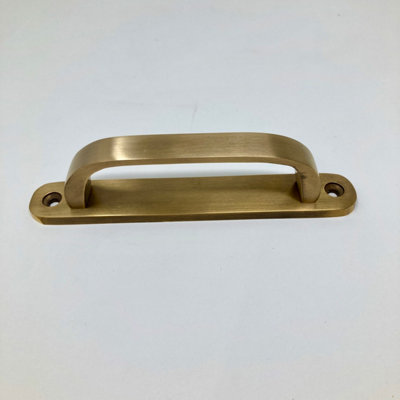 Small Backplate Handle Unlacquered Aged Brass
