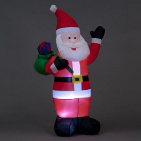 Snowtime Inflatable Santa with Raised Left Arm and Gift Bag