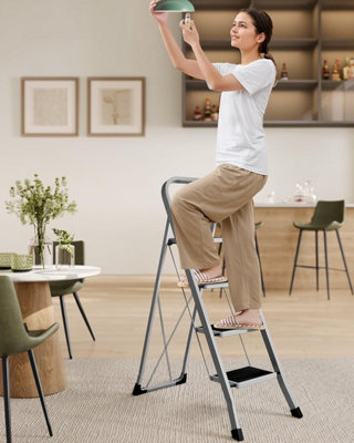 SONGMICS Compact 4-Step Folding Ladder, Features Safety Lock and Space-Saving Design for Convenient Storage, Dove Grey