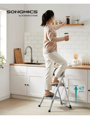 SONGMICS 2-Step Folding Ladder - 330 Lb Capacity, Non-Slip Rubber Steps, Compact Steel Design With Handle, Cloud White