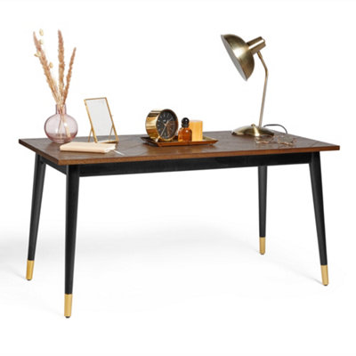 Black desk deals with gold accents