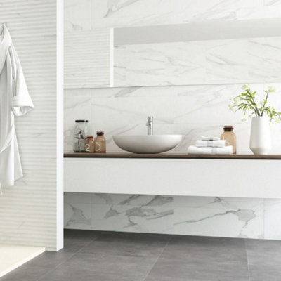Stately White Marble Matt Porcelain Tile 60 x 60cm | £46.58 at B&Q