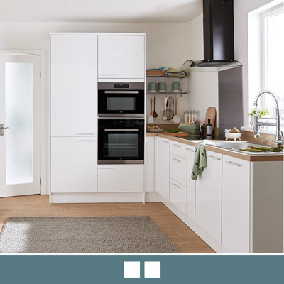 Explore the Stevia gloss white kitchen, featuring high shine slab doors for easy cleaning.