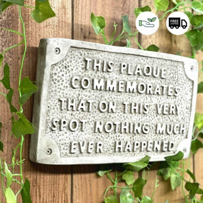 Stone cast Humorous Wall Sign "Nothing happens in this spot"
