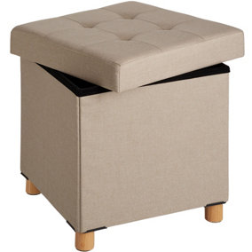 Stool Alea in upholstered linen look - foldable 300kg load capacity - sand
