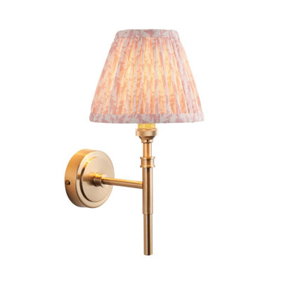 Stylish Dimmable Wall Light with Peachy Shade and Aged Brass Finish