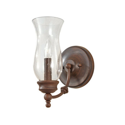 Stylish Heritage Bronze Wall Light with Shapely Storm Glass Shade