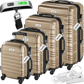 Suitcase Set Mila - 4 hard-shell cases made of robust ABS plastic including luggage scales and tags - champagne