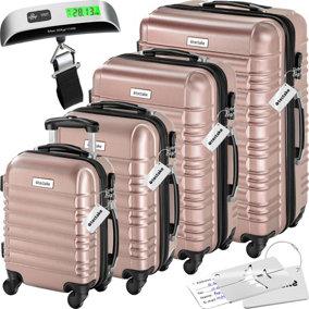 Suitcase Set Mila - 4 hard-shell cases made of robust ABS plastic including luggage scales and tags - rose gold
